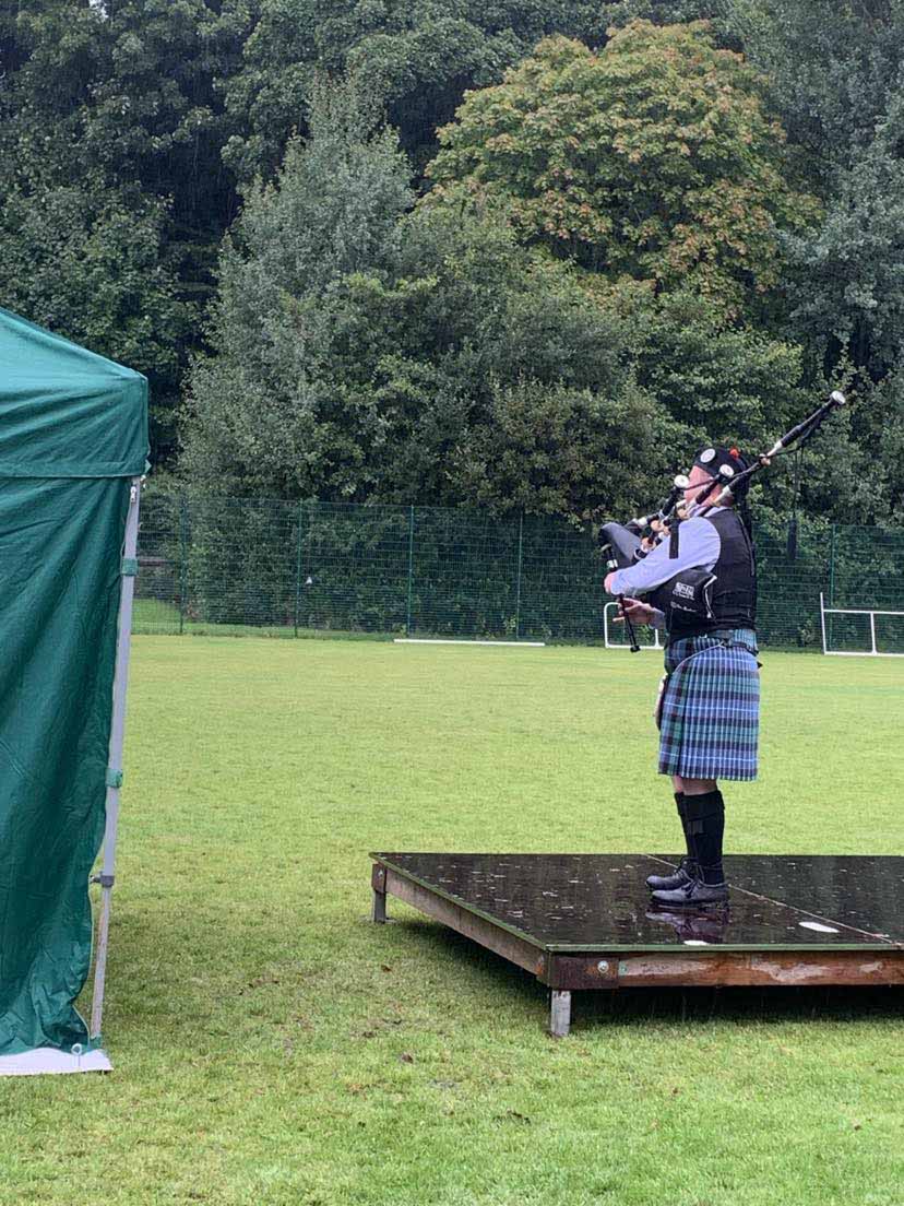 Callum Beaumont on his way to winning the A-Grade Strathspey & Reel in the teeming rain. The judges selected "The Little Cascade" for him to play twice over.
