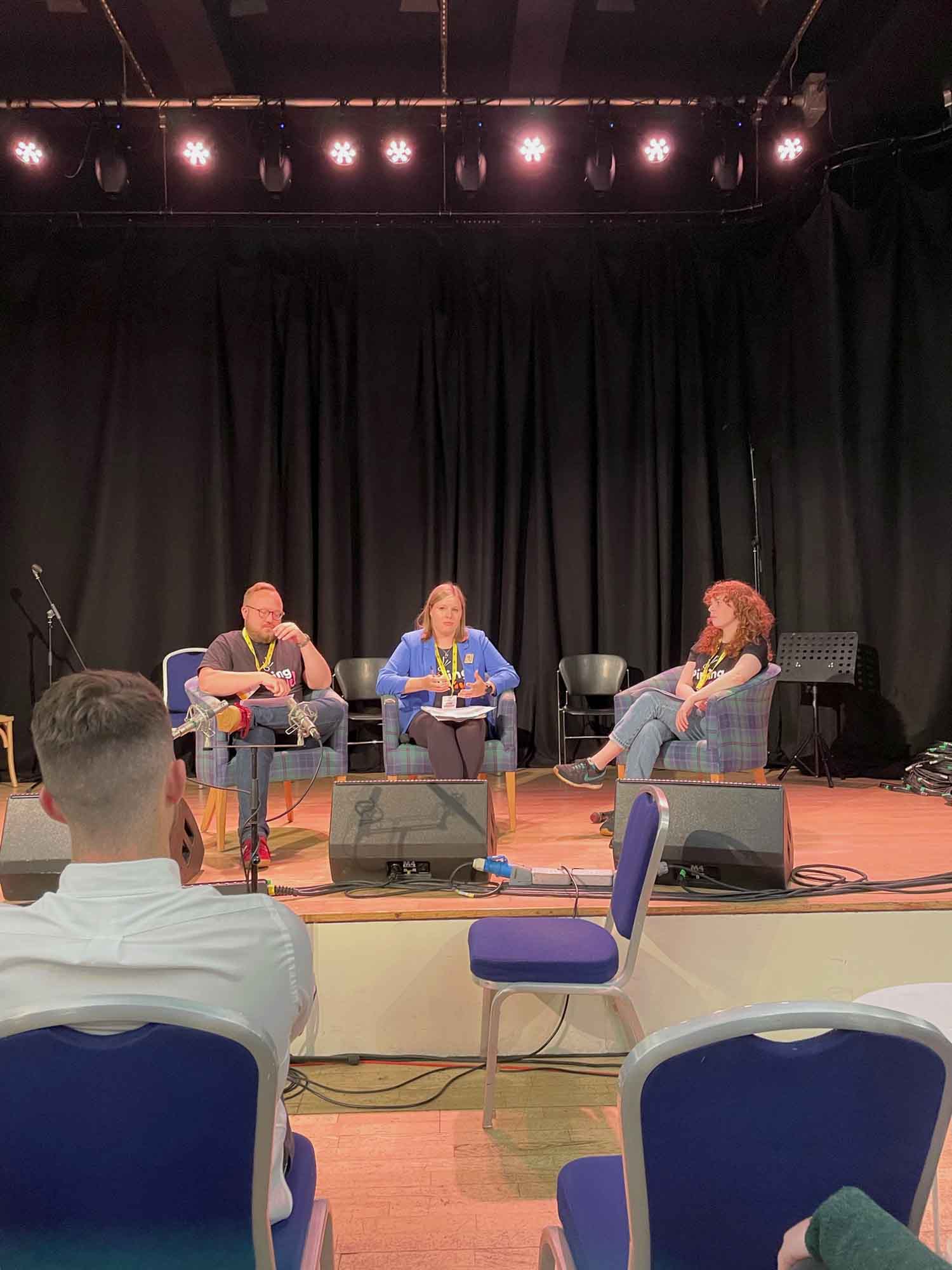 Andrew Bova, Helen Urquhart and Ailis Sutherland speaking at the Women in Piping and Drumming in Scotland symposium at Puiping Live! 2023