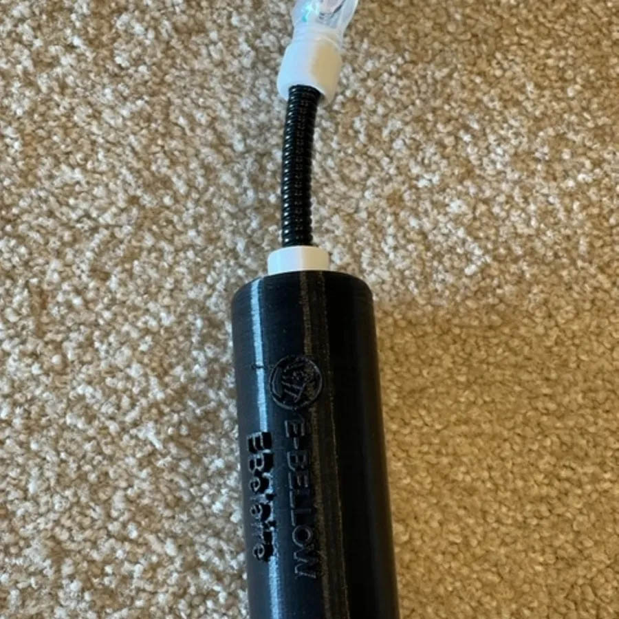 Lazeroff created a "Bite Switch Activator" that allows the player to start and stop their EBelaire by biting down on the add-on device at the right moments.