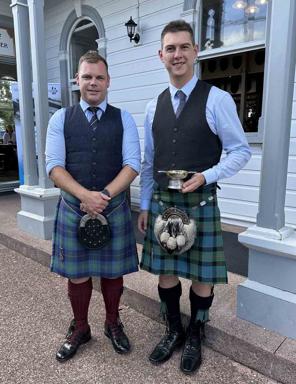 Piers Dover (right), winner of the 2023 Northcote Invitational Solo Piping Competition, with Stuart Easton, who judges both events.