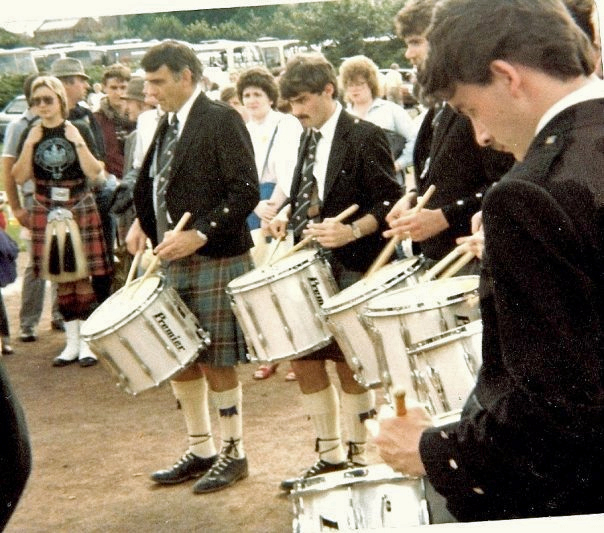 Neil Sloan, centre, playing with the Boghall & Bathgate Caledonia drum section and Leading-Drummer Tom Brown (left) at the 1985 World Pipe Band Championships.