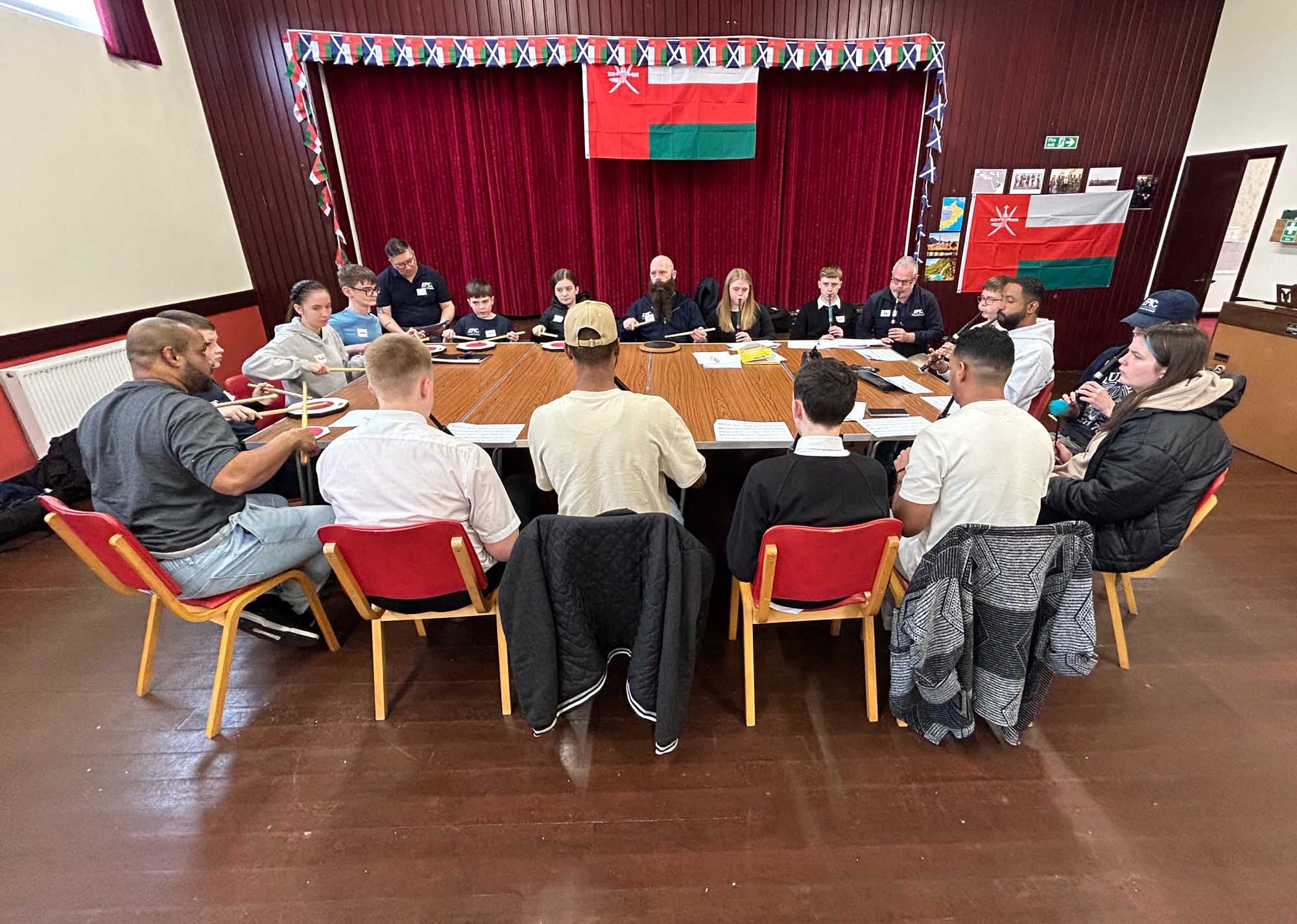 Ayrshire learners get together with pipers and drummers from the Royal Air Force of Oman in Cumnock.