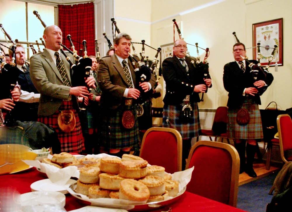 A typical communal tune by members of the Eagles, around 2012. Note the famous steak pies in the foreground.