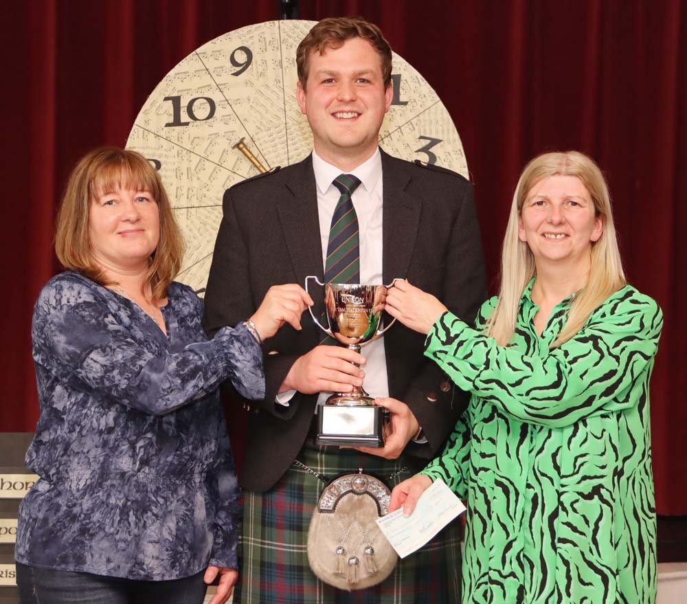 2024 Wheel of Fortune champion Craig Sutherland with representatives of the Unison Lothian Health Branch, sponsors of the event.