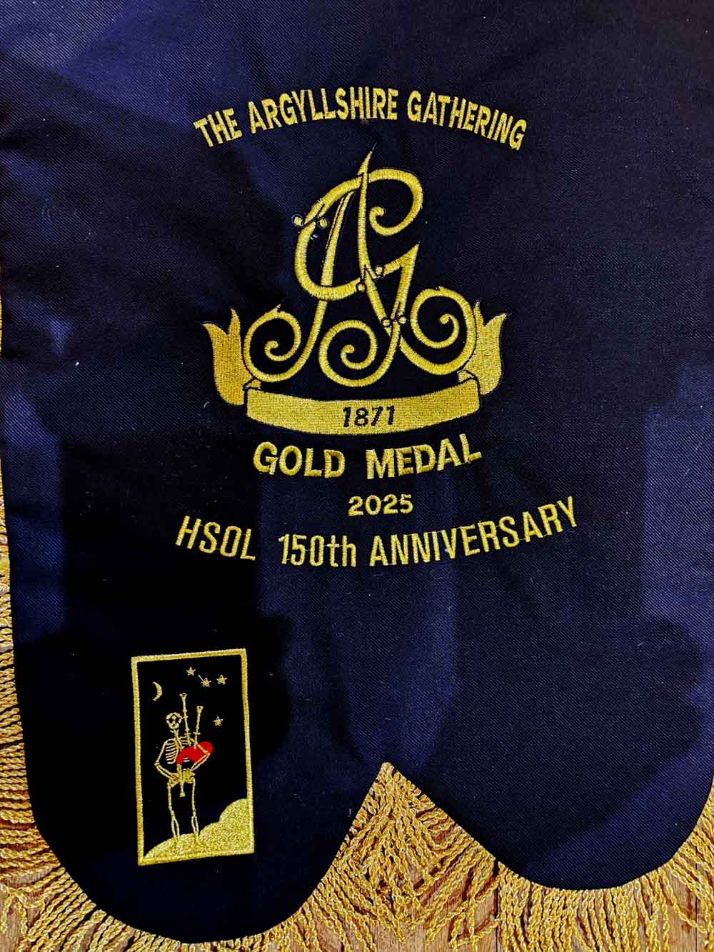 The special 150th anniversary banner to be presented to the 2025 Argyllshire Gathering Gold Medallist.