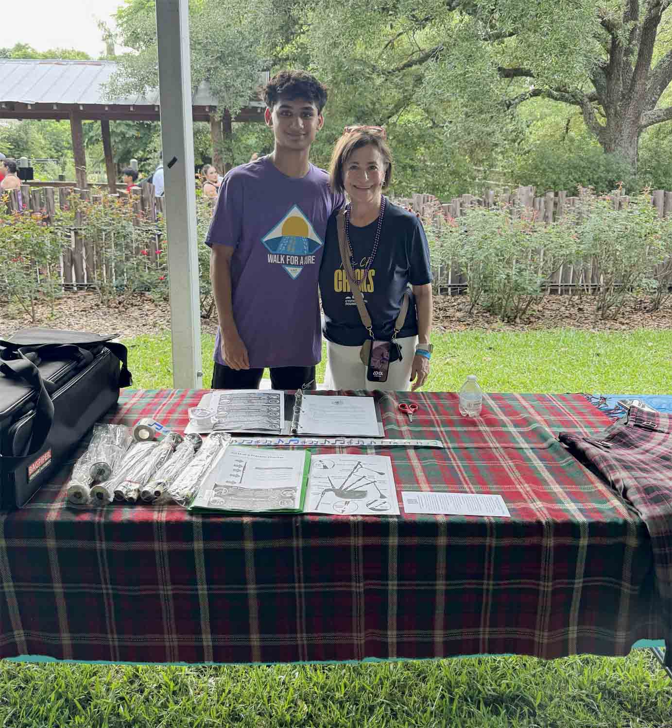 Keshav Harpavat at a Pipes for the People booth at a Highland games.