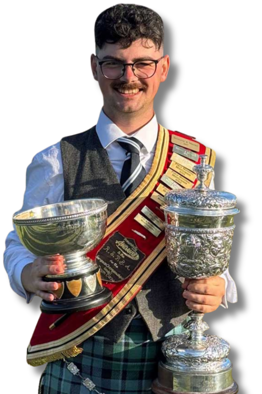 Cam Lawson with his band's hardware from the 2025 European Championships.