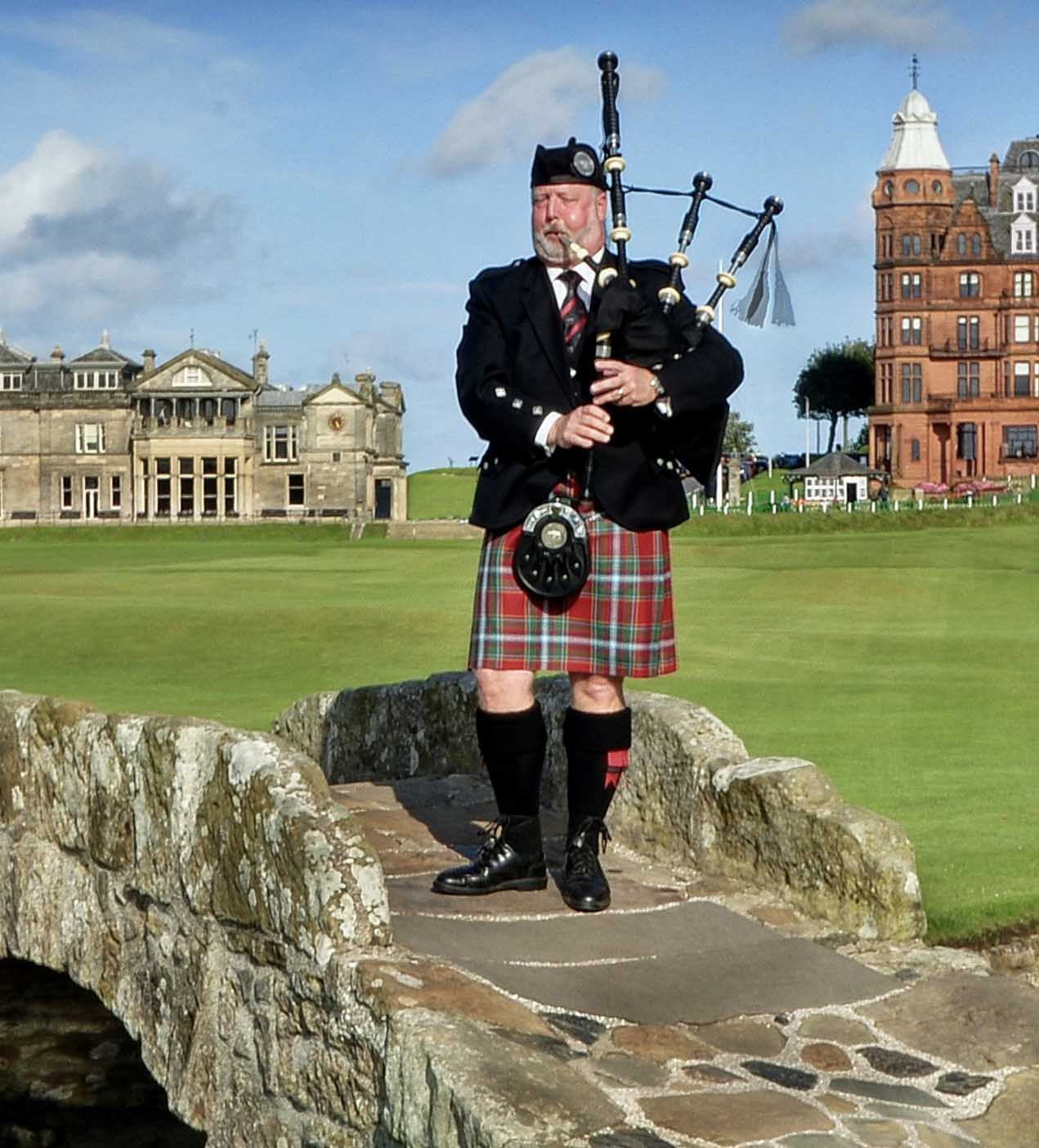 Scott MacDonald crossing another bridge - the Swilken Bridge at the Old Course, St. Andrews Golf Club in Scotland.