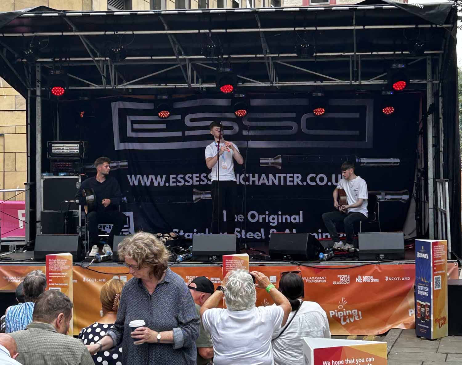 The Calum Macaskill Trio entertains a warm, sun-drenched crowd.