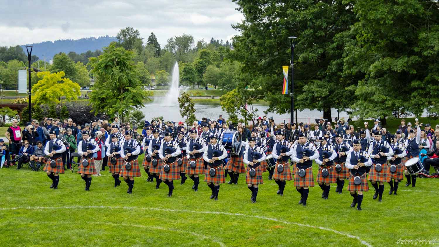 SFU marches into the competition circle to perform at the BC Highland Games.