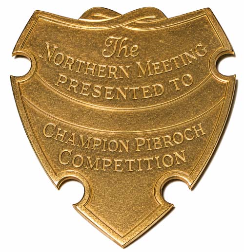 The Clasp, which "clasps" onto the Gold Medal ribbon