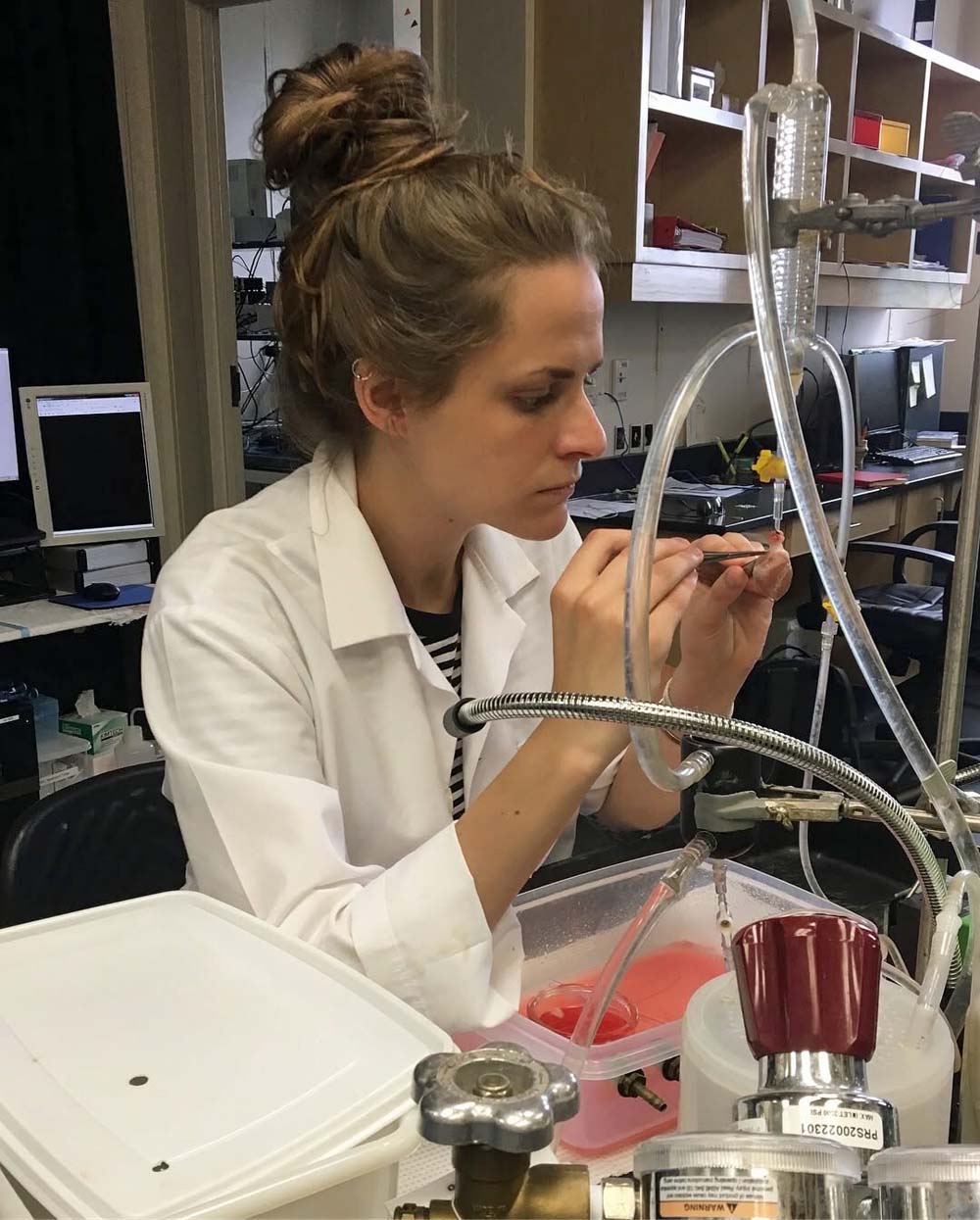 Dr. Eilidh MacDonald at work in the research lab