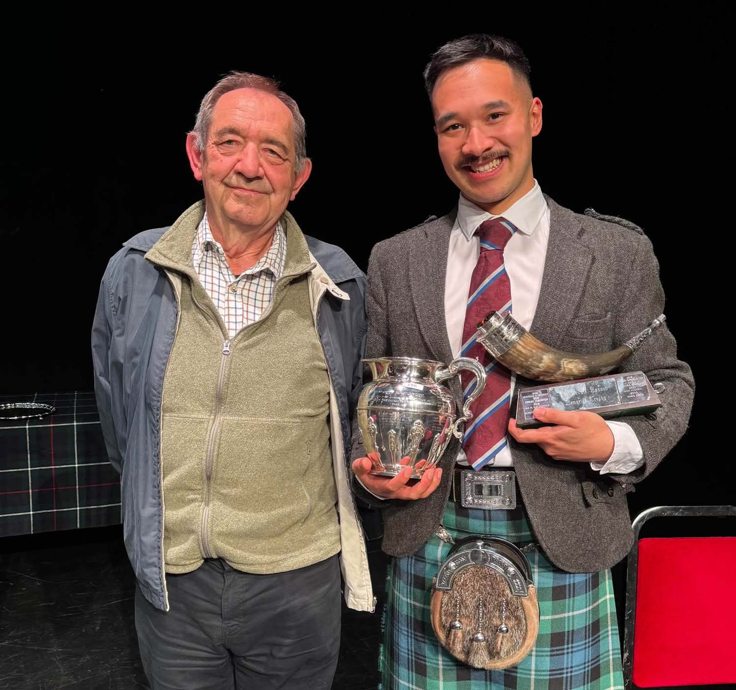 Calum Brown with his father and first piping teacher, Graham, at the 2026 Northern Meeting