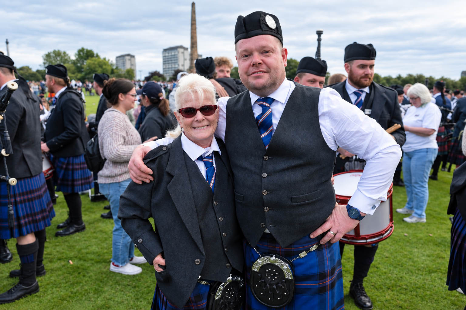 Ulster Scottish Lead-Drummer Derek Cooper with his mother, Traci Cooper, a longtime playing member and now manager with the band.