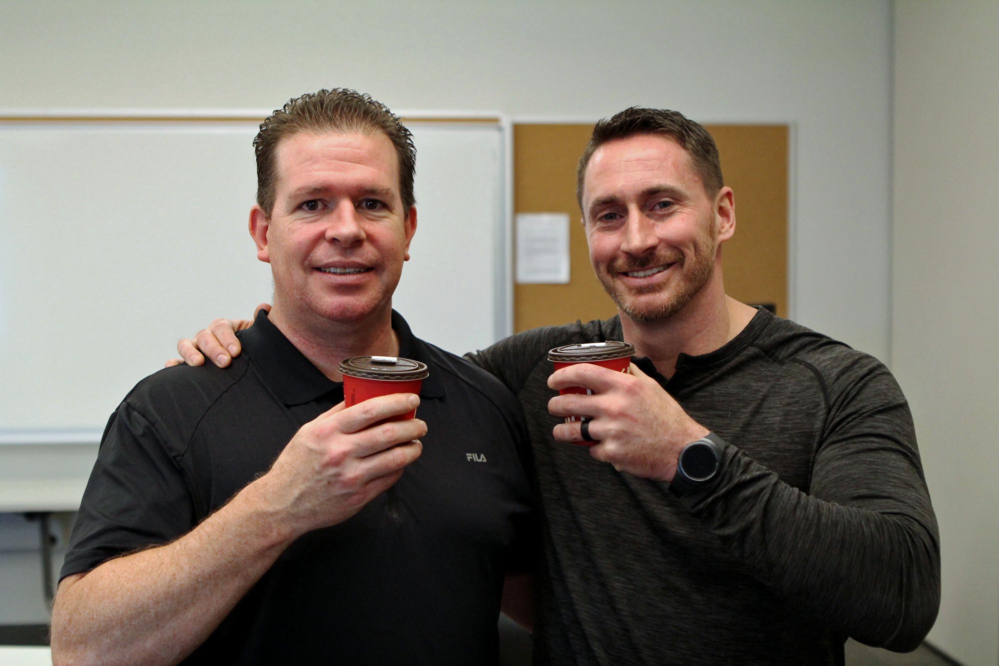 Ian K. MacDonald and Sean McKeown toast their 2016 double successes with a classically Canadian Tim Hortons "double double."
