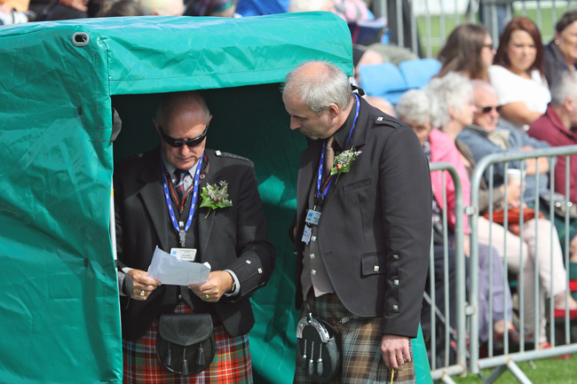 RSPBA officials having a chat before a competition begins.