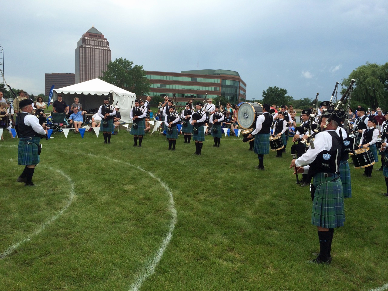 The Grade 2 Greater Midwest Pipe Band competing in concert formation at the 2015 Chicago Highland Games.