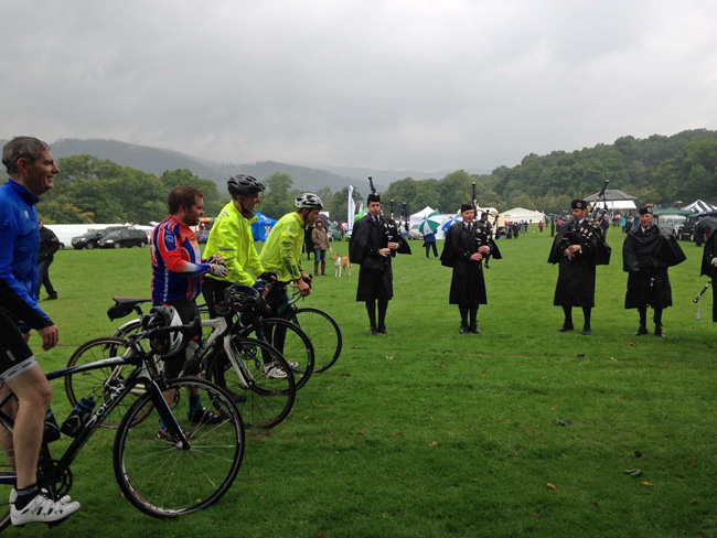The arrival of band members by bike at the Pitlochry games park.