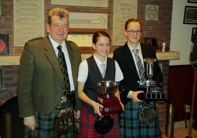 Adjudicator Colin MacLellan, B-Division winner Drew Mackay and A Division winner Gavin Mackay at the 2016 Toronto Amateur Knockout.