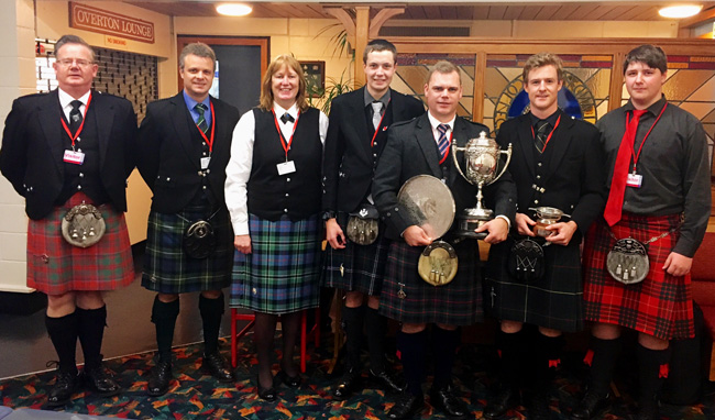 Judges and competitors at the 2016 R.U. Brown Cup in New Zealand (L-R): Alistair Hanning, Stewart McKenzie, Marion Horsburgh, Callum Carn, Stuart Easton, Willie Rowe and Sebastian George.