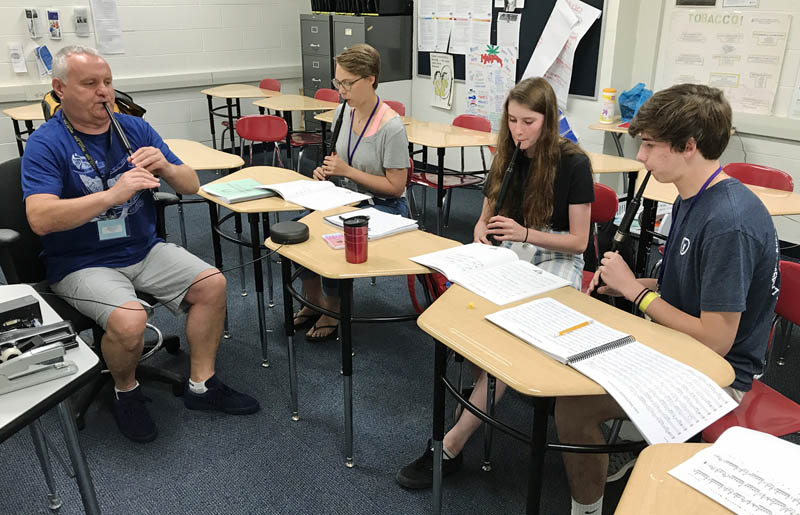 Instructor Robert Mathieson works with a small class at a 2017 Balmoral School.