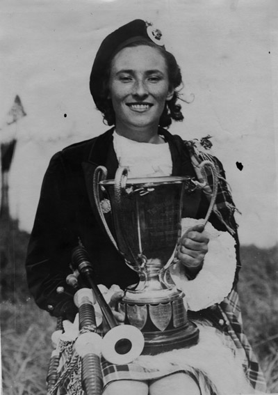 Edith MacPherson, Invergordon Games, September 18, 1947. Taken after winning the Kincraig Cup for Piobaireachd.