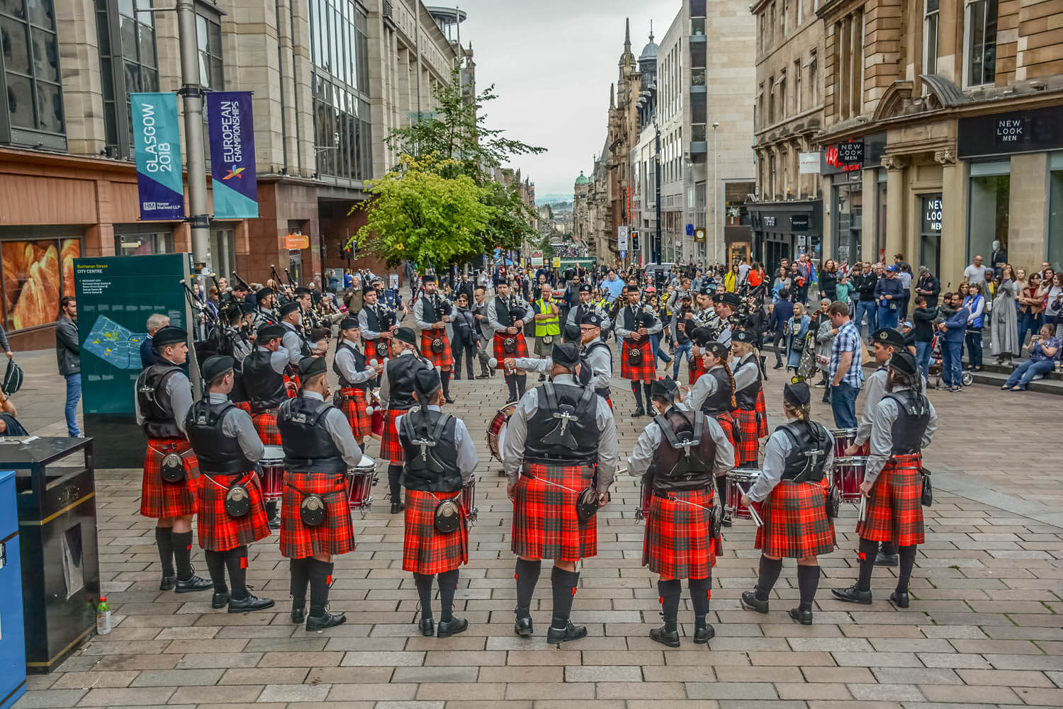 Manawatu Scottish performing on Buchanan Street in Glasgow during Piping Live! 2018.