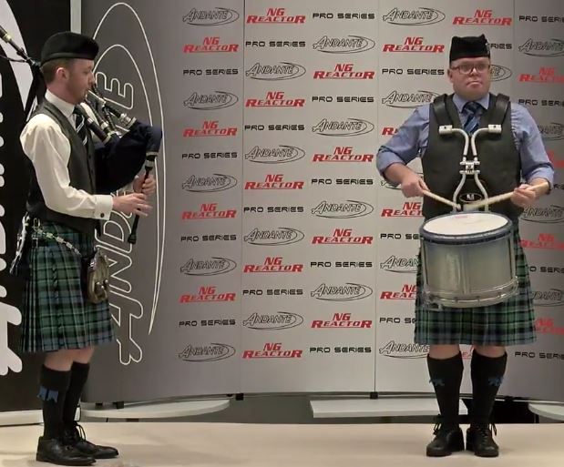 2018 World Solo Drumming Champion Steven McWhirter with piper Daniel McDermott.