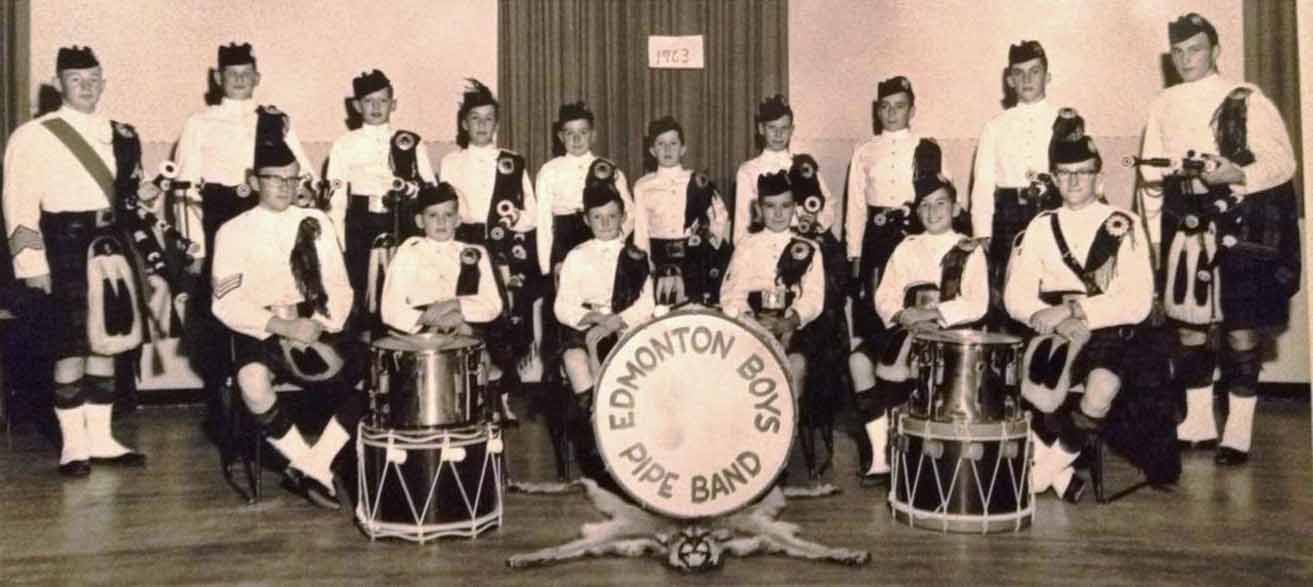 In 1963, after the band had moved to distinctive white tunics.