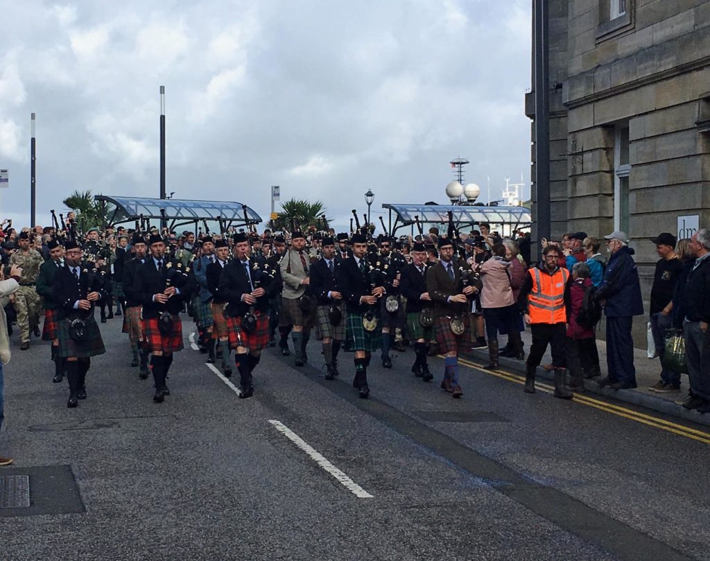 The beginning of the march to the Argyllshire Gathering through the town of Oban, with Gold Medalist Andrew Hayes in the pipe-major's spot and Ben McClamrock, Silver Medalist, as pipe-sergeant.