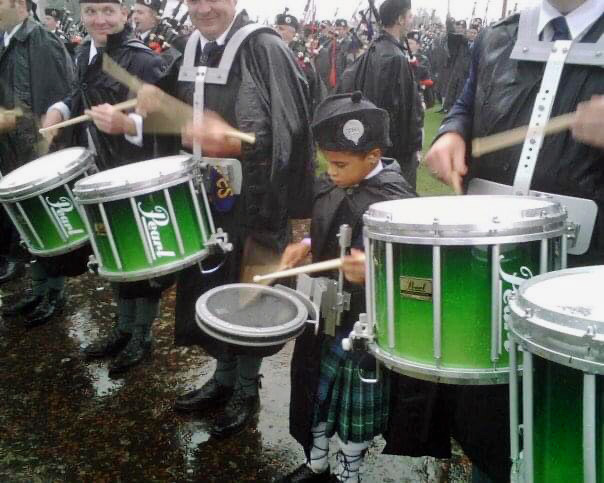 A very young Kolton Stewart gets a guest spot with the Grade 1 78th Fraser Highlanders at the World Pipe Band Championships.