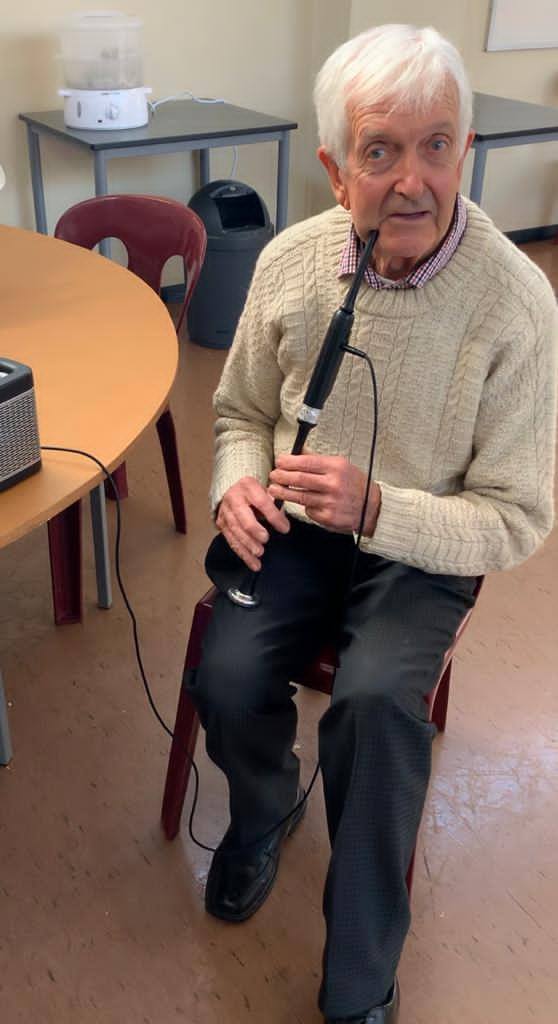 Donald Blair playing his son Murray's Digital Chanter.