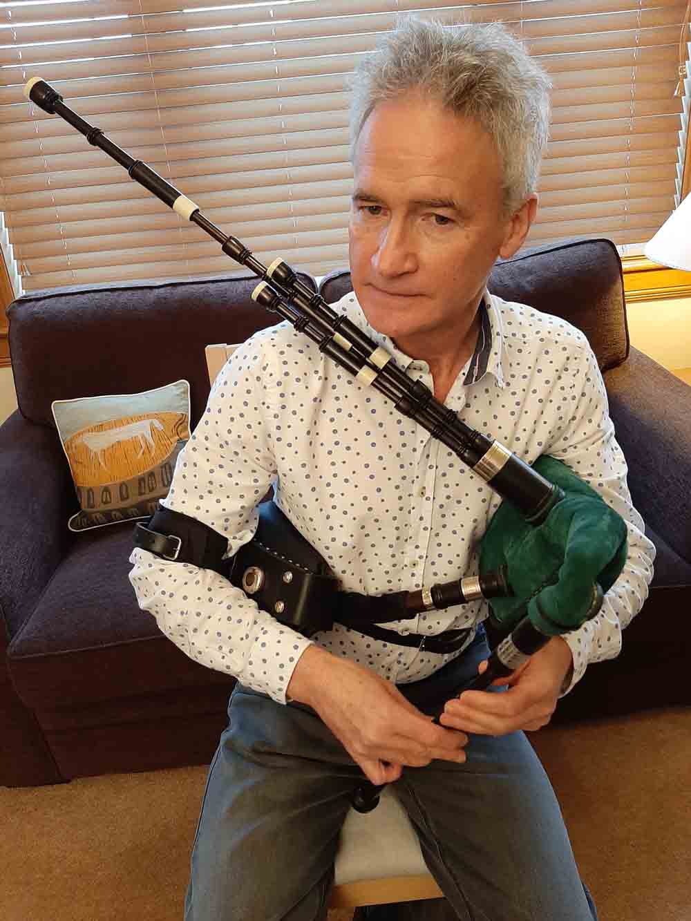 Iain MacInnes playing a set of Nigel Richard Border pipes.
