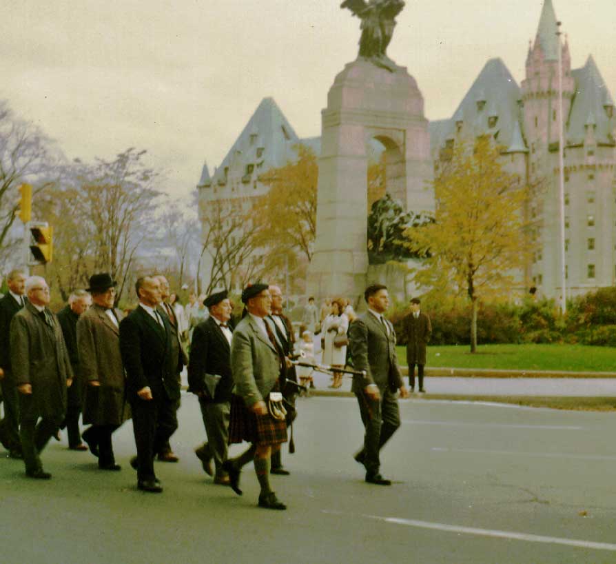 P-M Sam Scott leading a procession at the National War Memorial in Ottawa, c.1965.