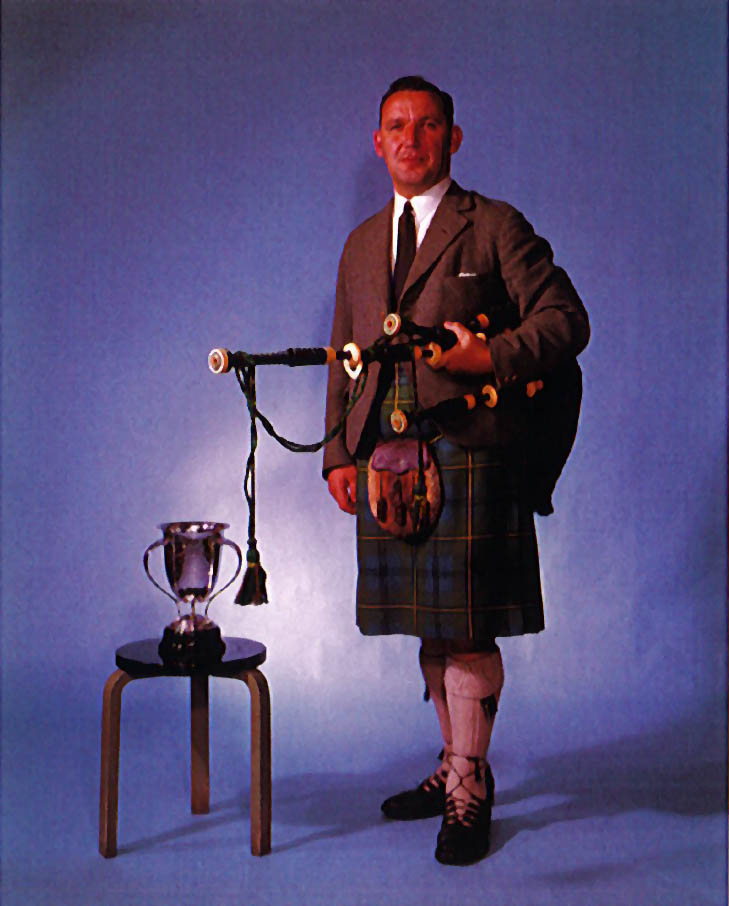 Duncan Johnstone with the 1964 SPA Knockout Trophy.