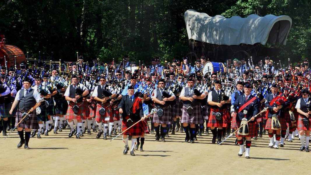 Drum-Major John Reids leads a massed bands in Alberta.