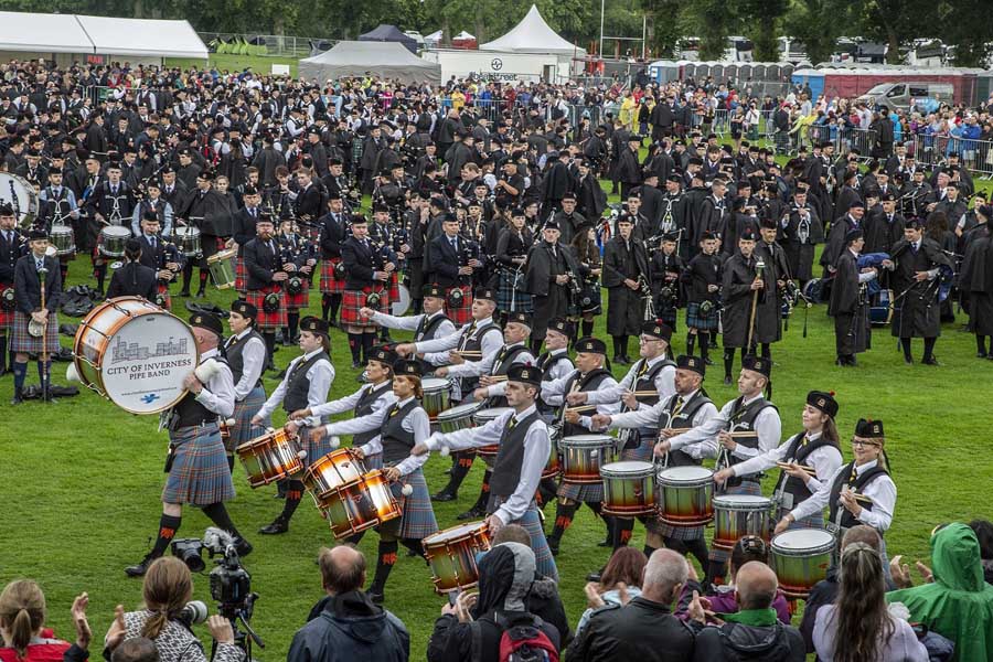 City of Inverness Pipe Band's drum section at the march past of the 2019 European Championships at Bught Park.
