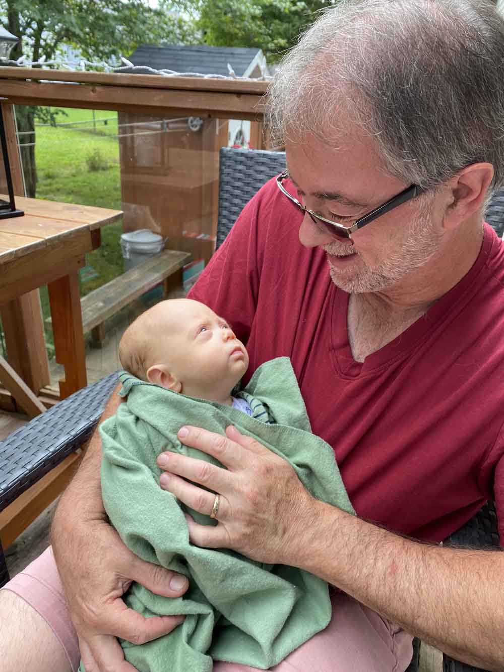 Bruce Gandy with his newborn grandson, Colin Alexander Gandy.