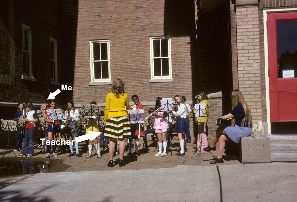 Playing the snare drum to "The Theme from Shaft" at Flynn Park Elementary School, 1973. That's Ms. Presgrave in yellow.