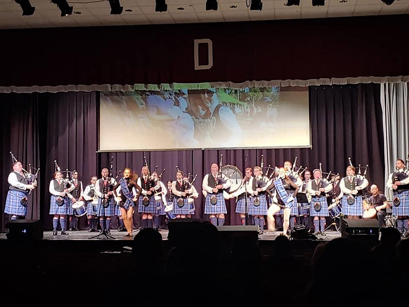 City of Dunedin and accompanying Highland dancers perform at the band's 'Highland Roads' concert in Dunedin, Florida.