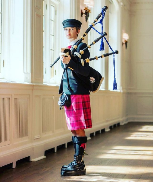 Jenna Dennison with her fashion-forward look as Holt Renfrew Ogilvy's piper.