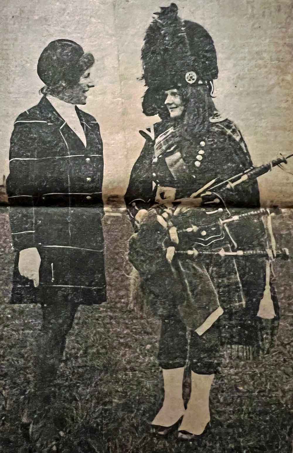 Anne Johnston in full British Caledonian Airways (Renfrew) Pipe Band number-one dress, chatting with one of the airline's flight attendants.